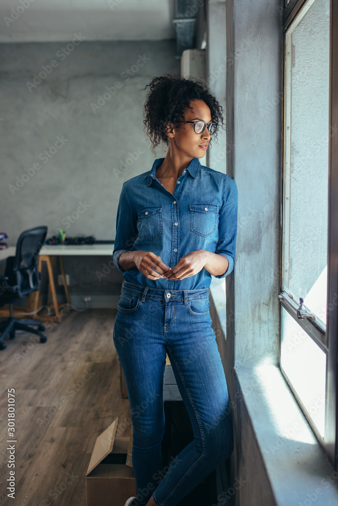 Thoughtful woman entrepreneur