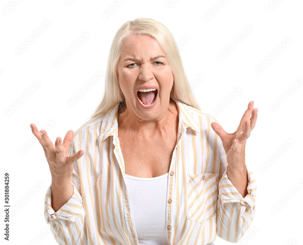 Angry mature woman on white background