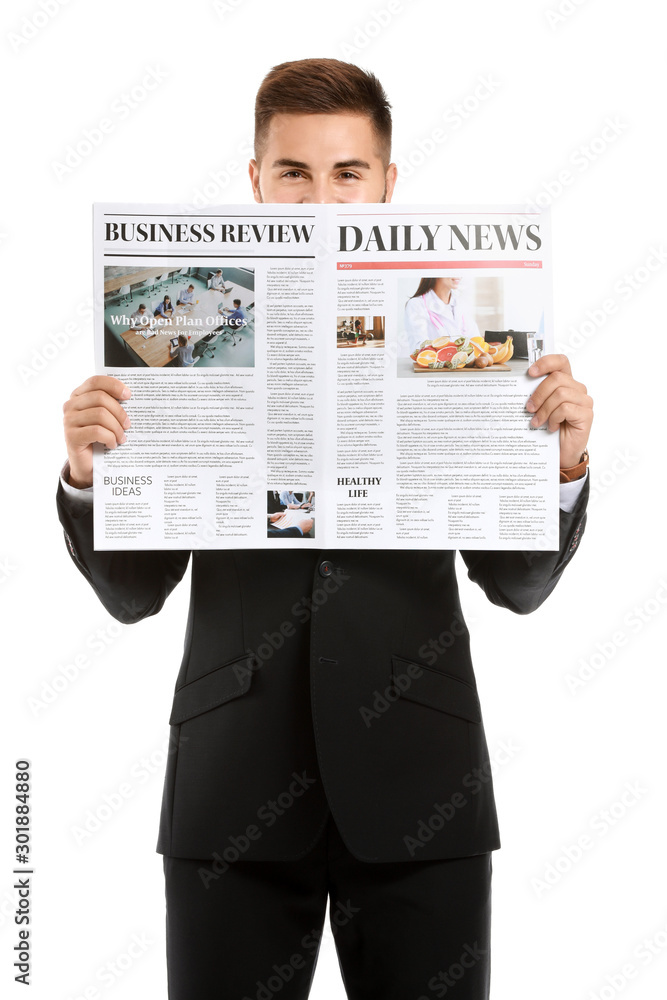 Handsome businessman with newspaper on white background