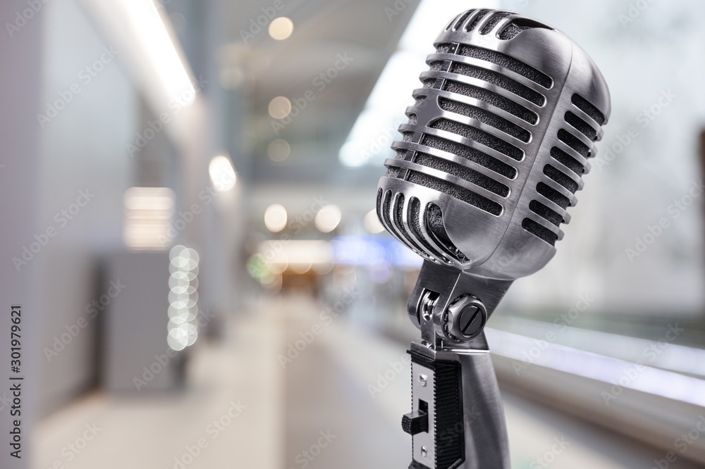 Retro style microphone on  background