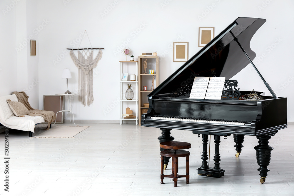 Interior of room with stylish grand piano