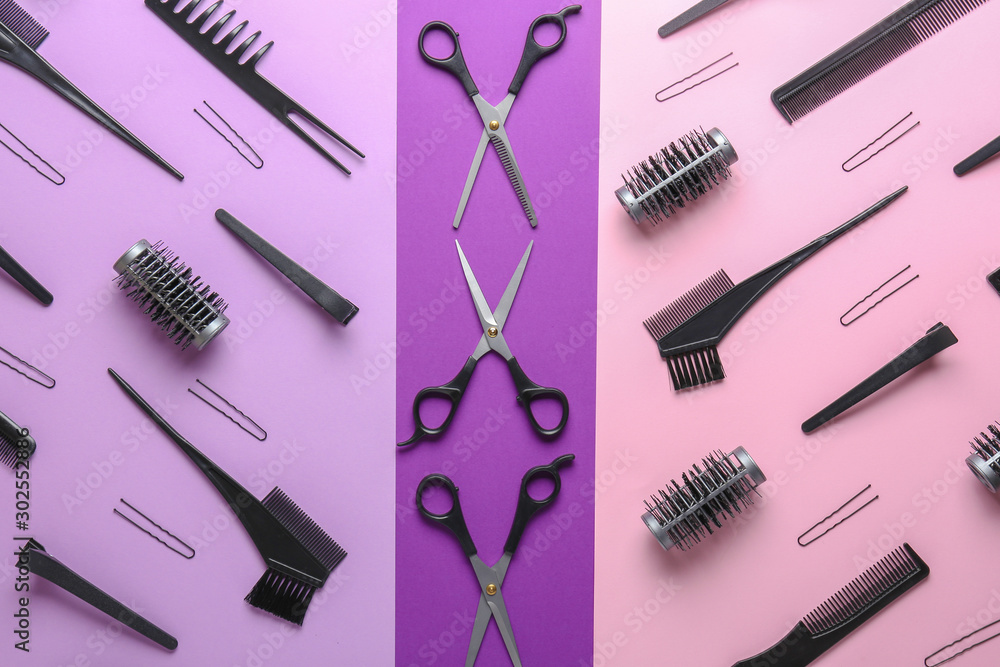 Set of hairdresser tools on color background