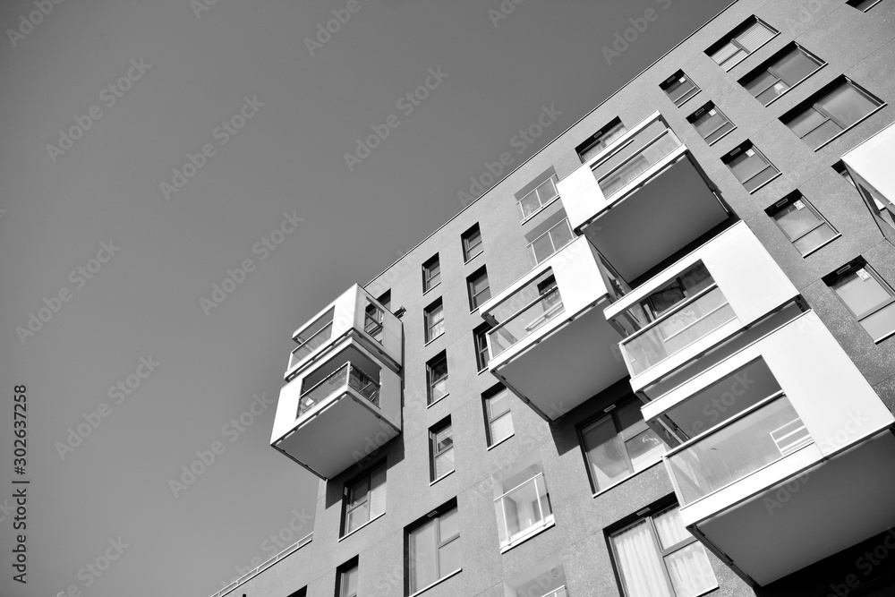 Contemporary apartment building. Generic residential architecture. Black and white.