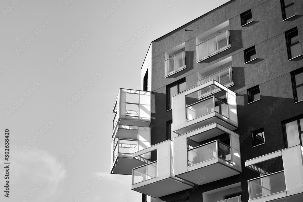 Contemporary apartment building. Generic residential architecture. Black and white.