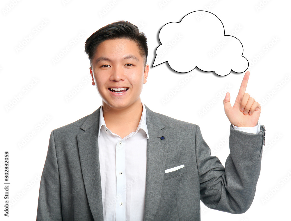 Portrait of Asian businessman with raised index finger on white background