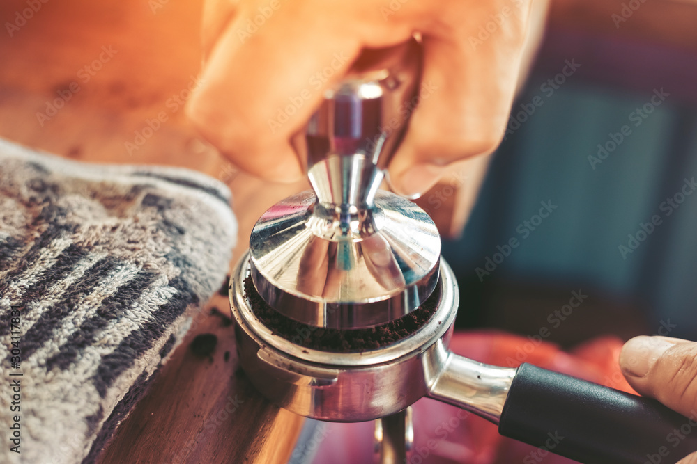 Barista pressing coffee, morning coffee and coffee machine