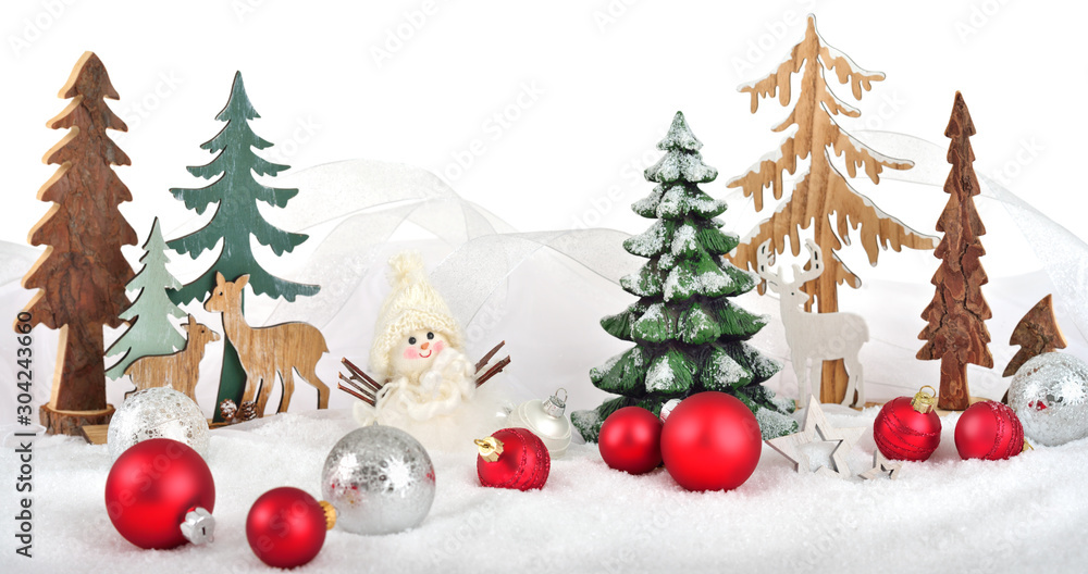 Bright winter Christmas arrangement with snow, wooden decoration, snowmen and baubles, isolated on p