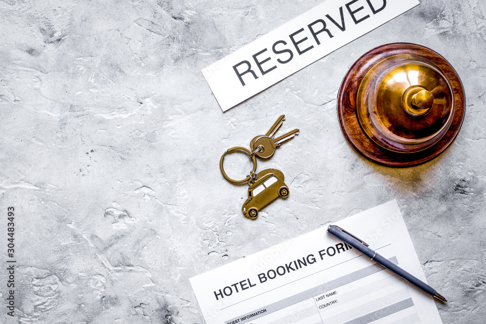 booking form for hotel room reservation stone background top view space for text