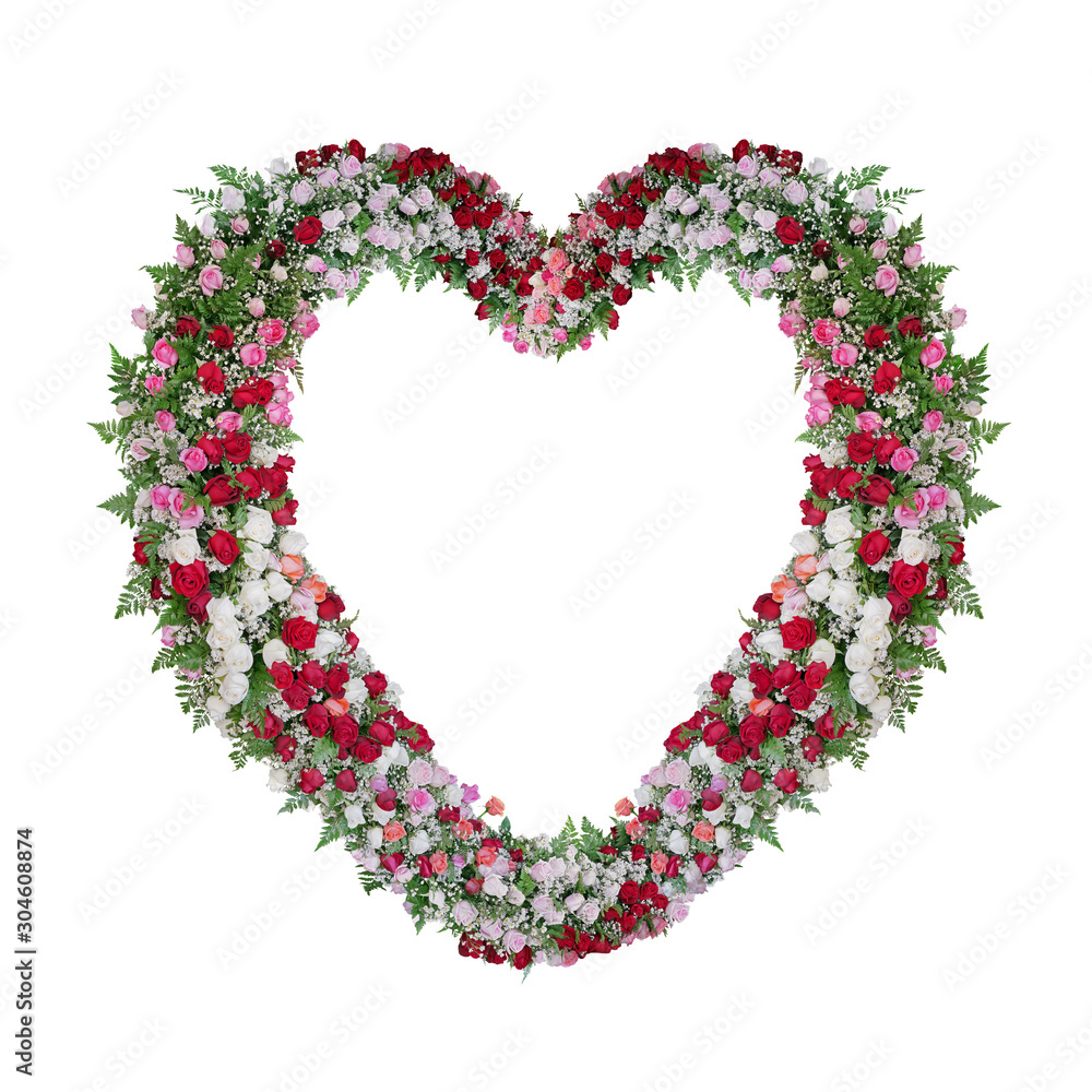 Beautiful heart shaped floral wedding arch with colorful roses flowers and tropical fern leaves, Val