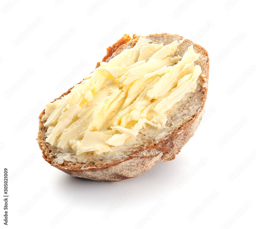 Piece of bread with butter isolated on white