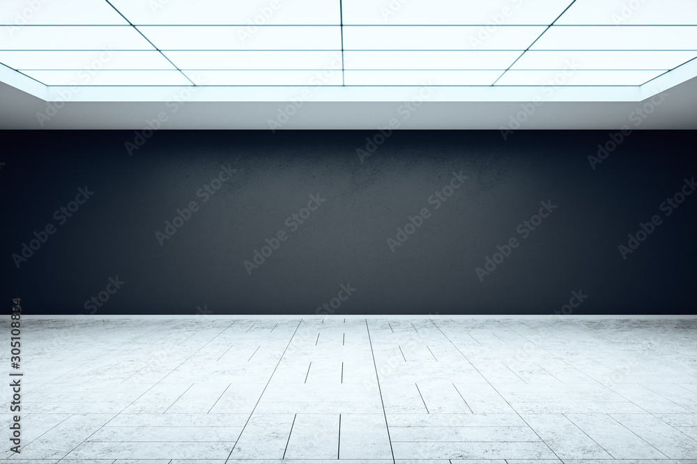 Office space with empty gray wall