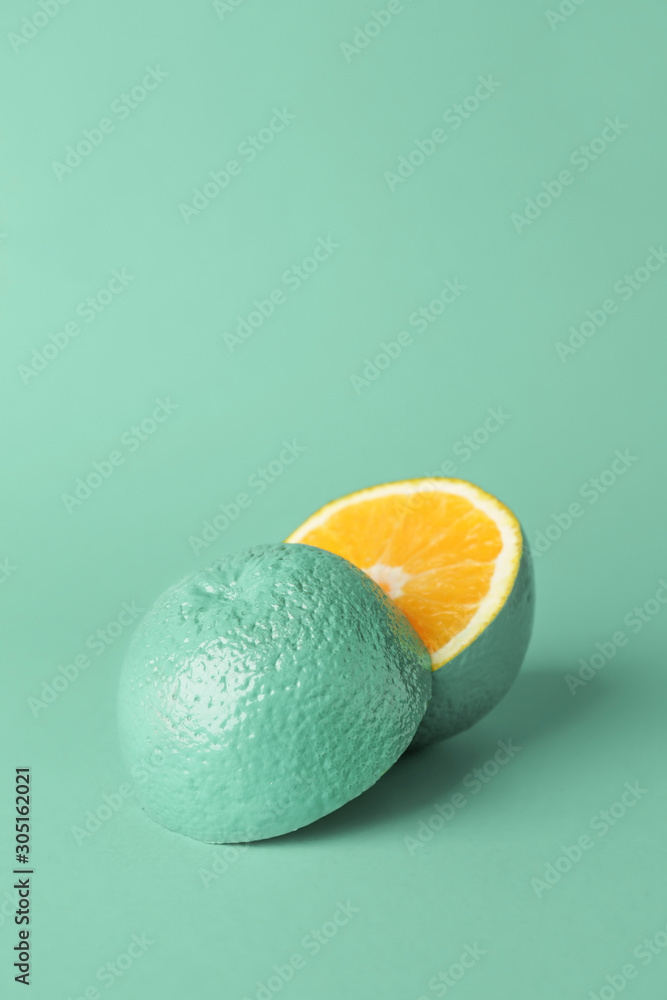 Painted turquoise orange on color background