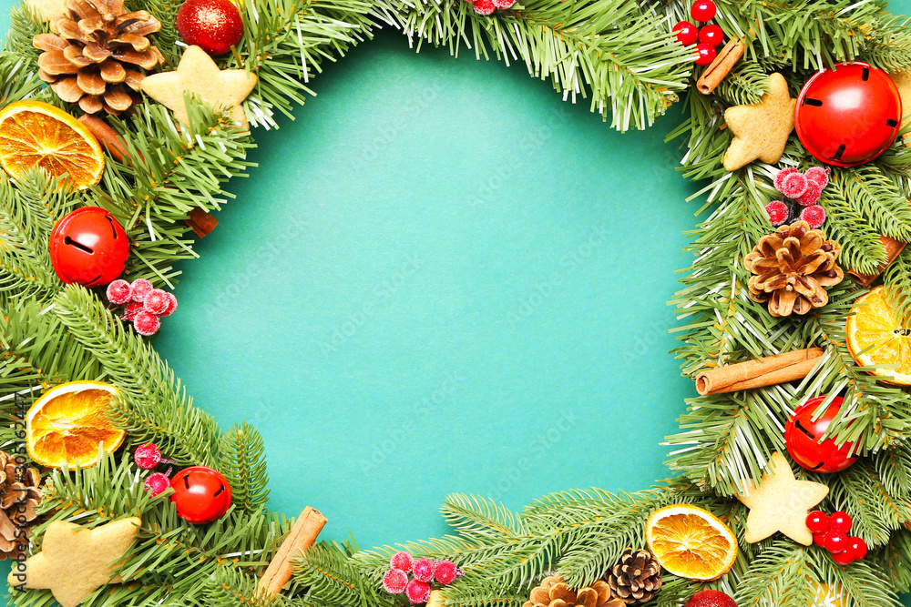 Beautiful Christmas wreath on color background