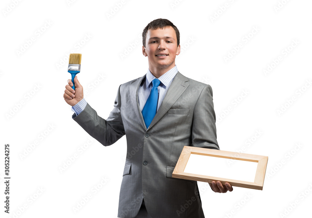 Creative businessman painter holding paintbrush