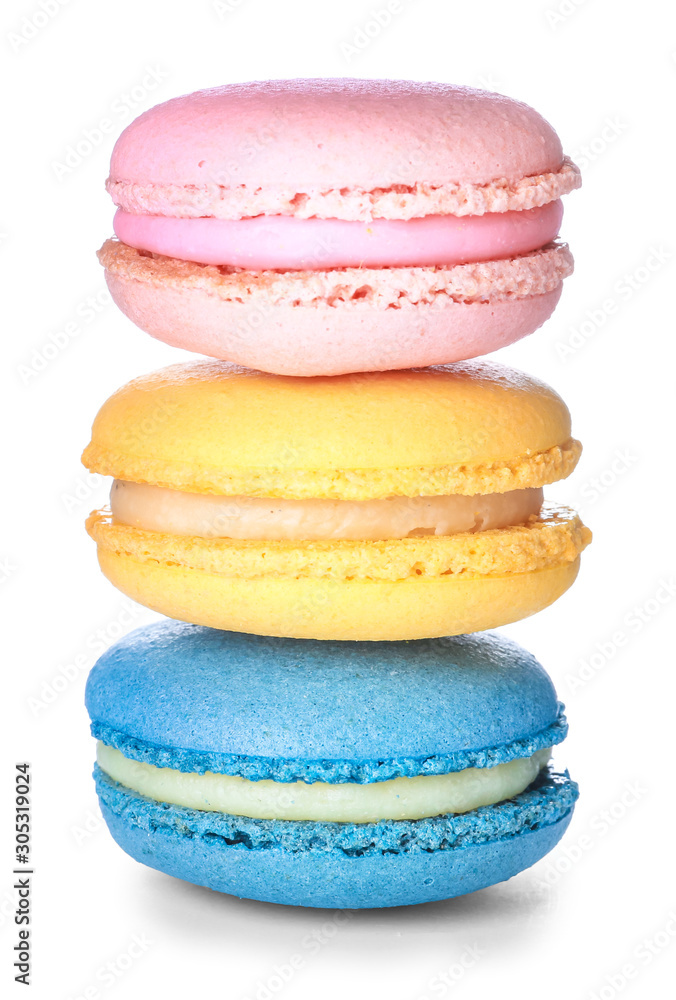 Different tasty macarons on white background