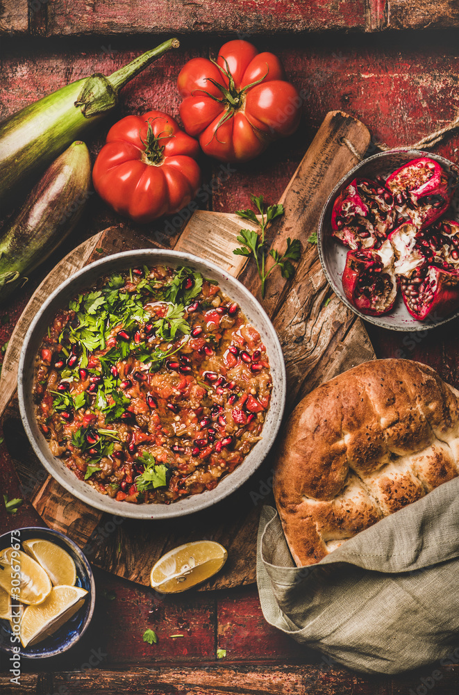 Turkish and Middle East traditional meze starter. Flat-lay of Babaganoush cold dip seasoned with par