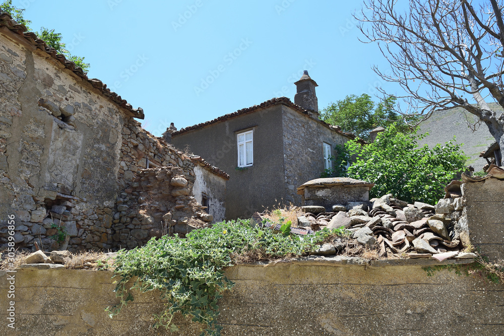 Ruined house in the abandoned Greek village Derekoy (Schinoudi) - turkish aegean island Gokceada