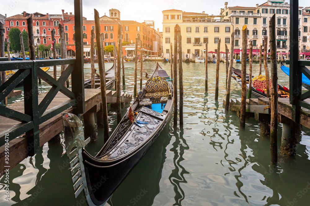 Grand canal of Venice city with boats and traditional colorful architecture, Italy