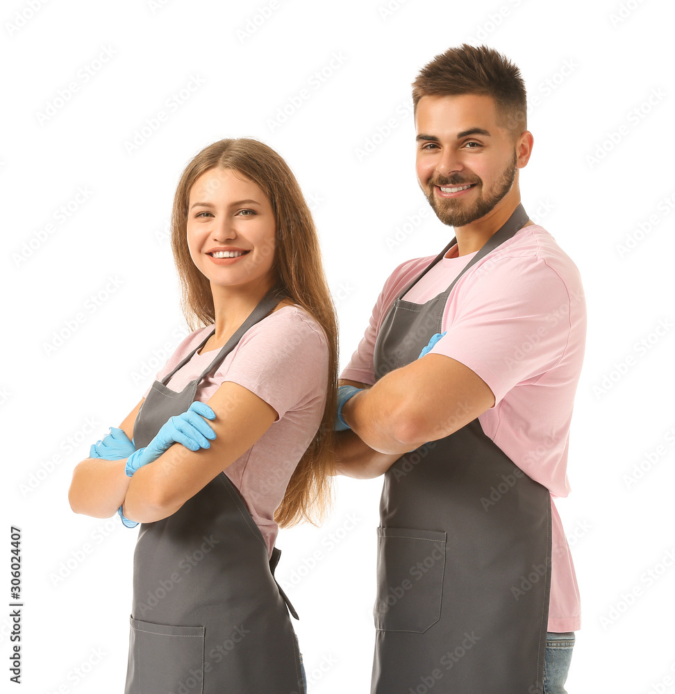 Team of janitors on white background