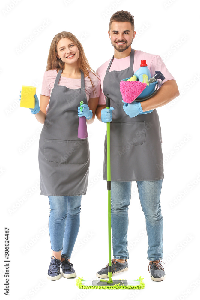 Team of janitors with cleaning supplies on white background