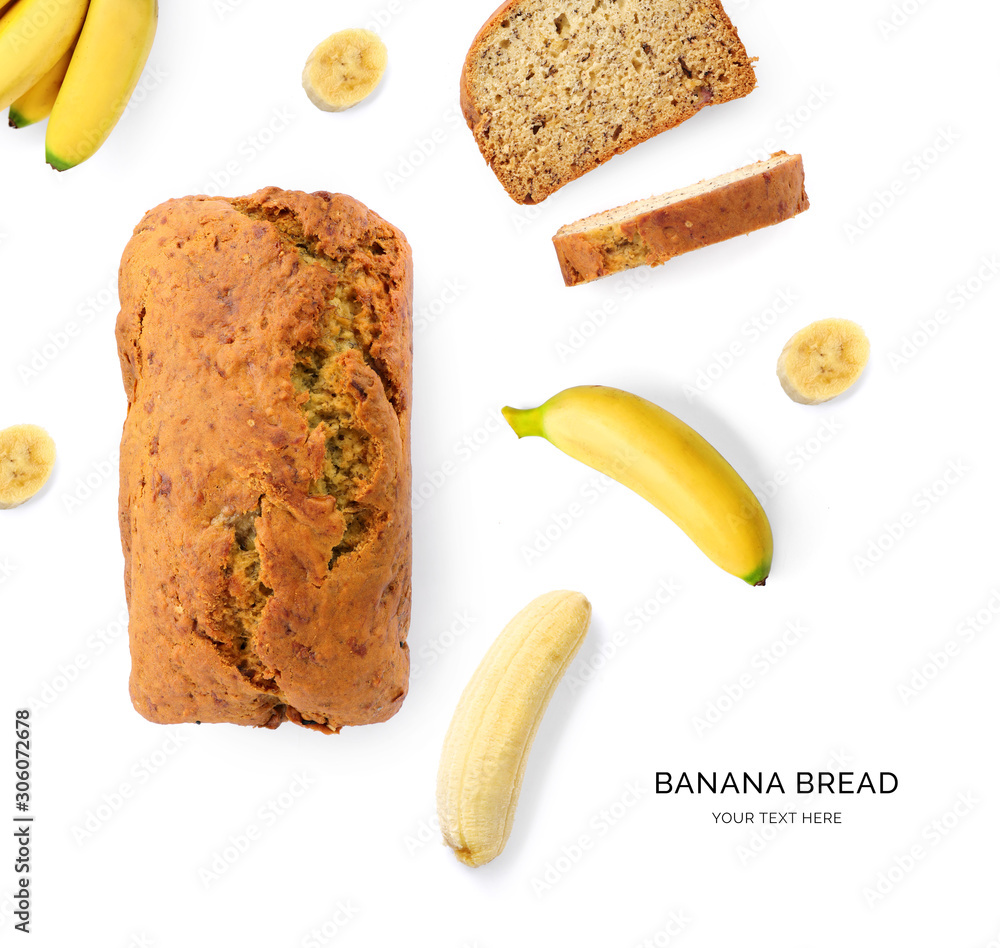 Creative layout made of banana bread on the white background. Flat lay. Food concept. Macro concept.