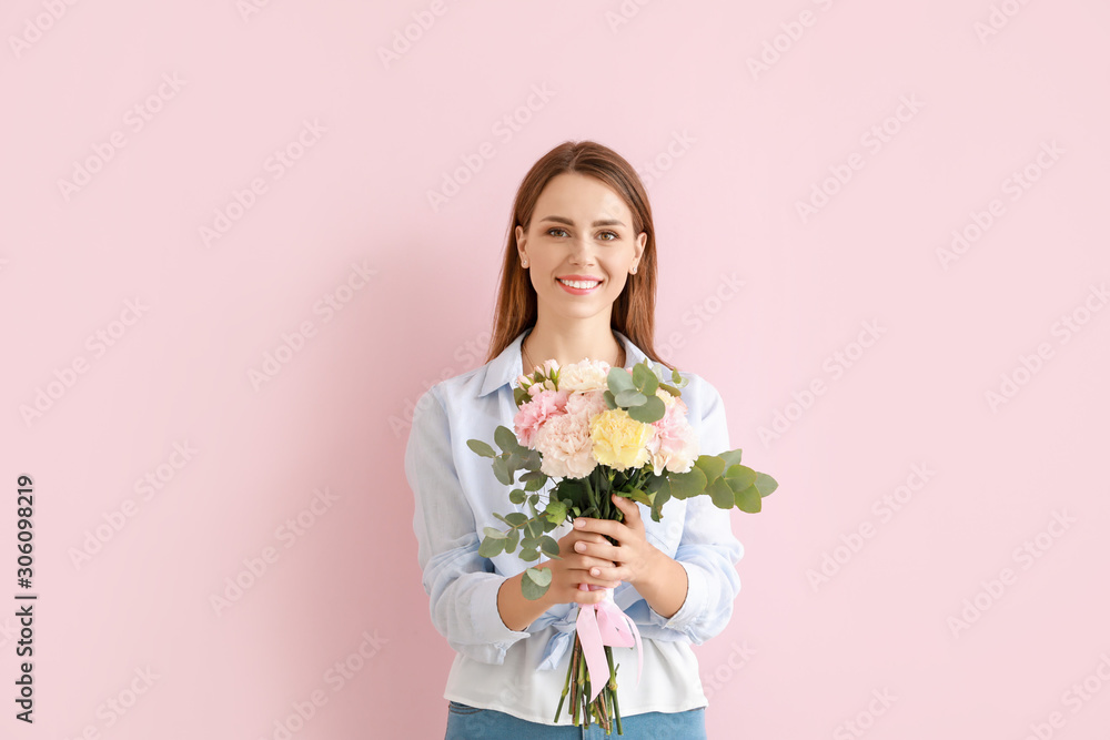 Beautiful young woman with bouquet of carnation flowers on color background