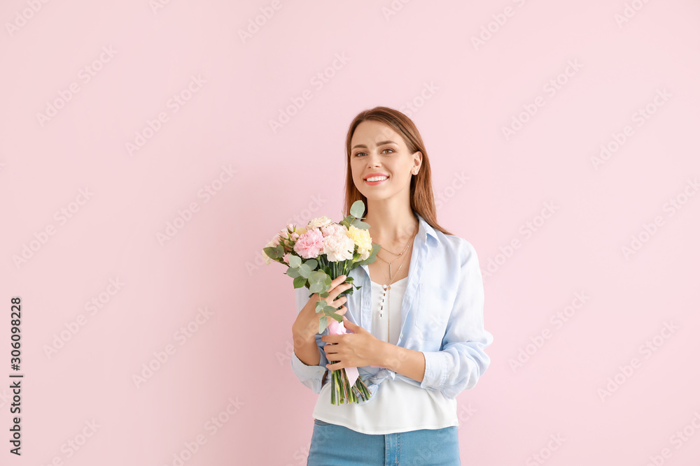 Beautiful young woman with bouquet of carnation flowers on color background