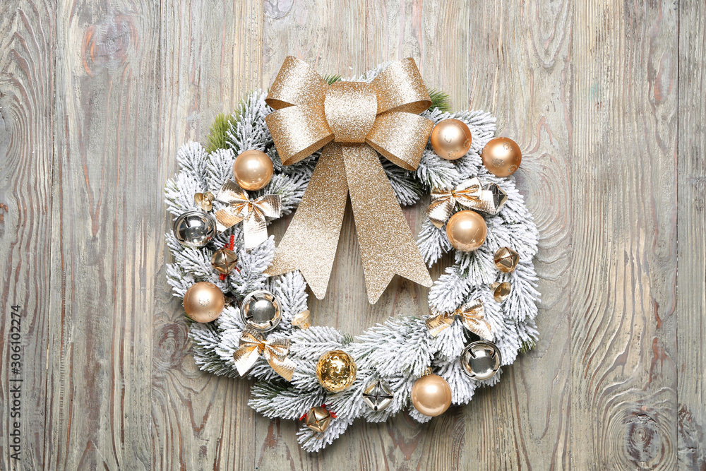 Beautiful Christmas wreath on wooden background