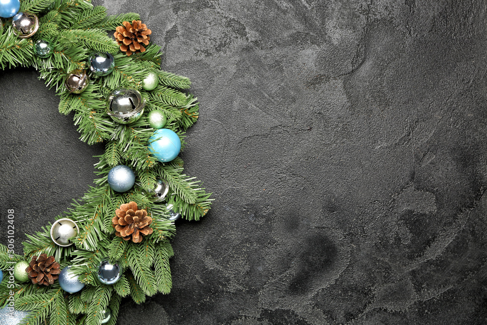 Beautiful Christmas wreath on dark background