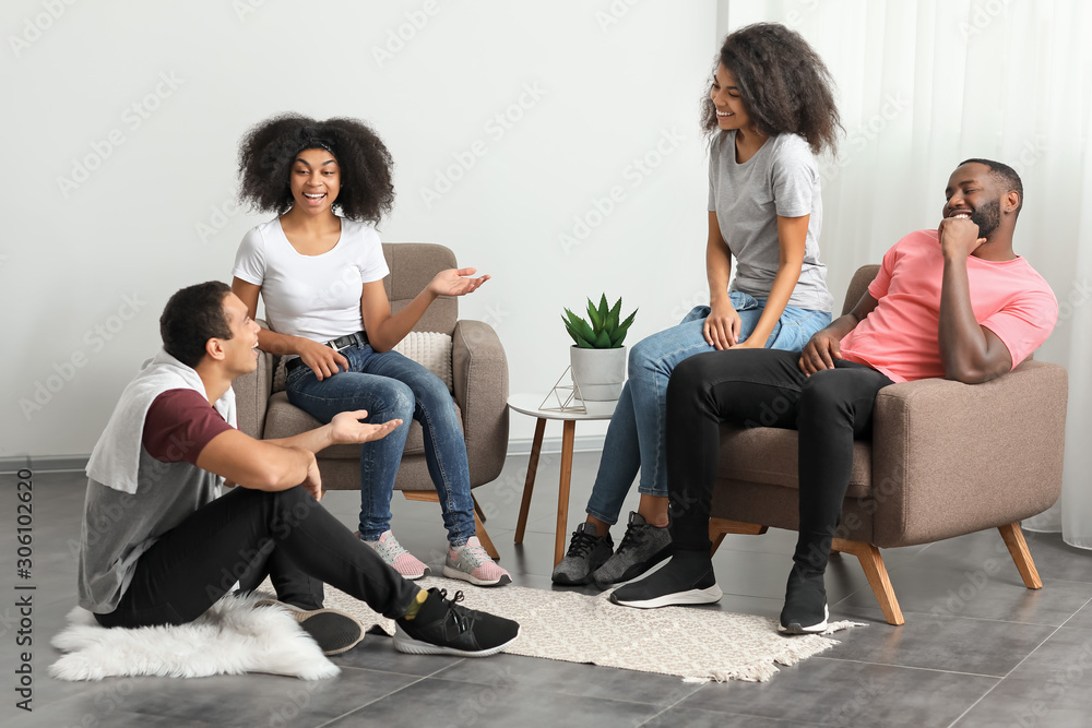 Young African-American friends meeting at home