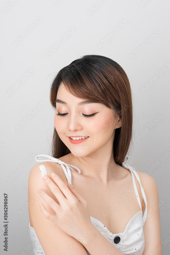 Attractive asian woman using serum. Woman lifestyle concept. isolated on white background.