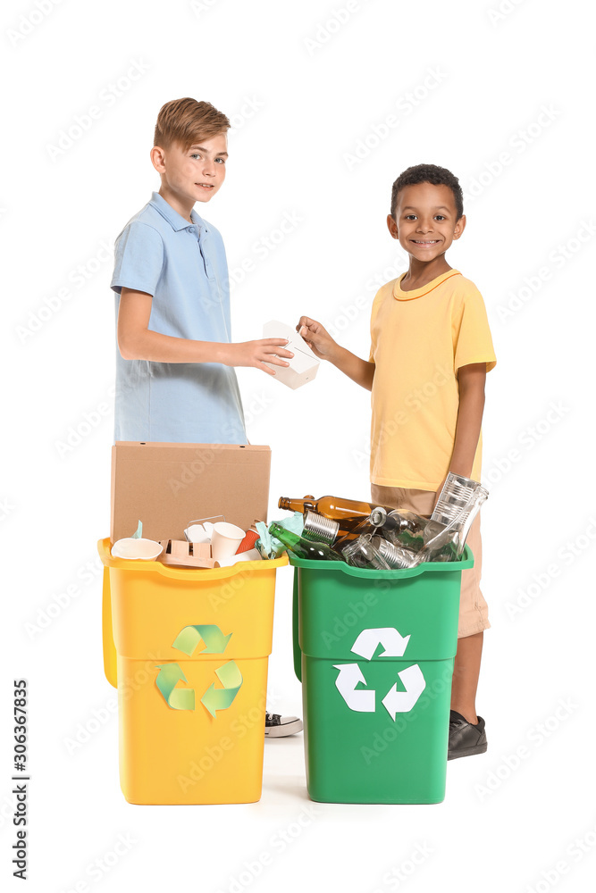 Little boys and containers with trash on white background. Concept of recycling