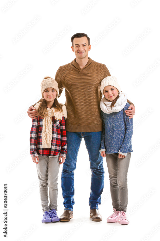 Happy family in autumn clothes on white background