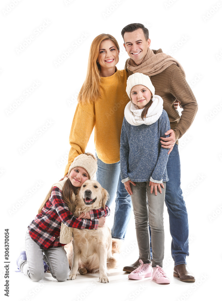 Happy family in autumn clothes and with dog on white background