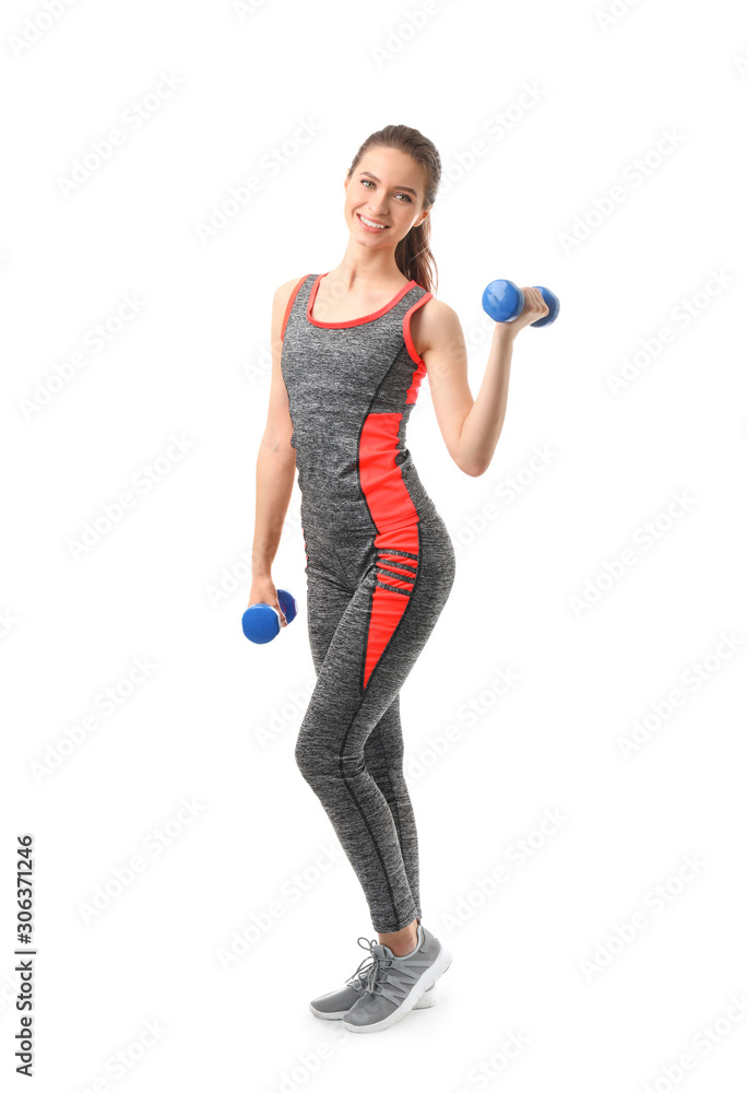 Sporty young woman with dumbbells on white background