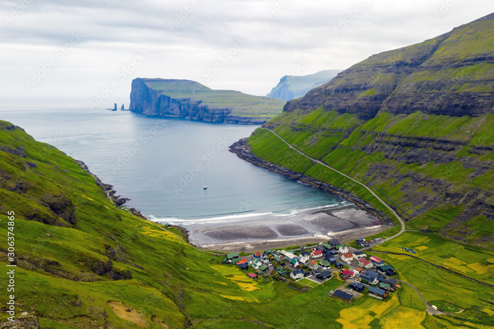 Aerial drone photo flying over Tjornuvik beach