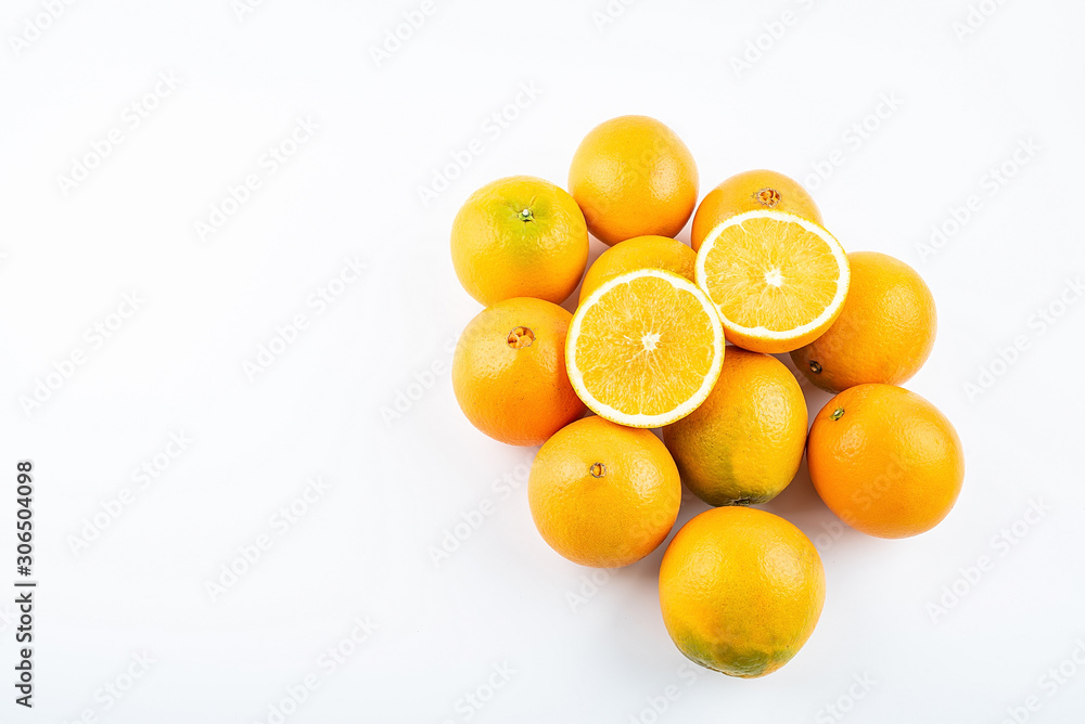 Fresh Nangan Navel Orange and pulp slices on white background