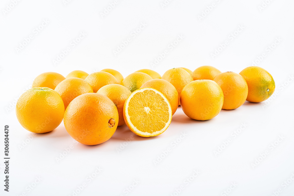 Fresh Nangan Navel Orange and pulp slices on white background