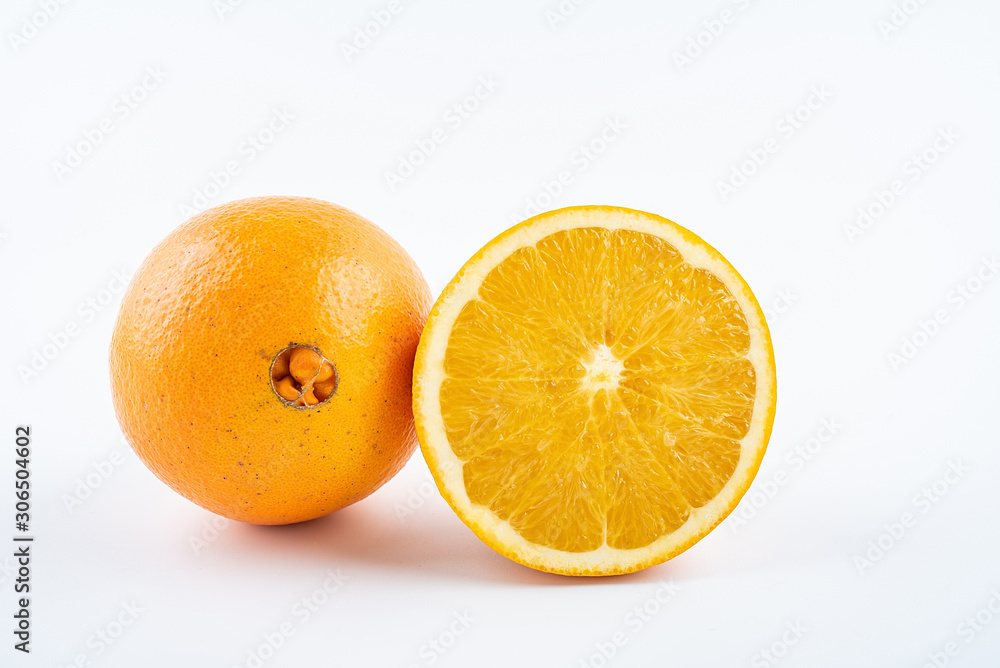 Fresh Nangan Navel Orange and pulp slices on white background