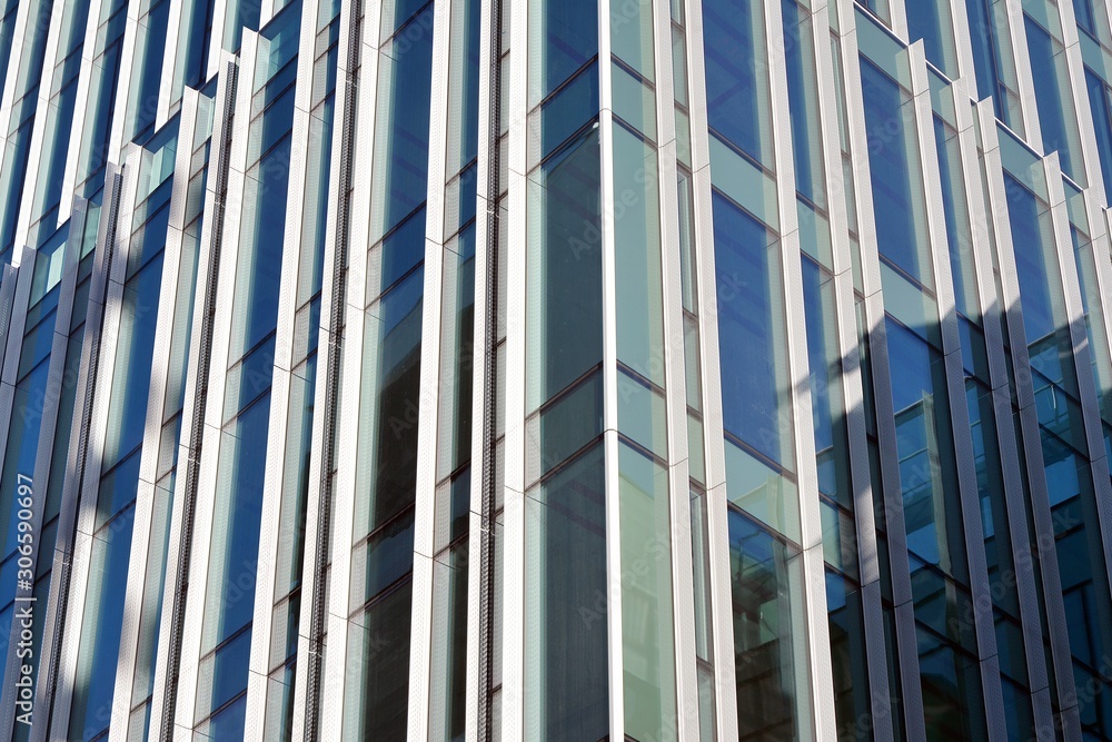 Abstract texture of blue glass modern building skyscrapers. Business background.