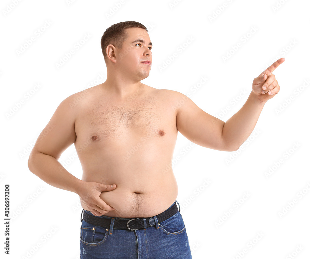 Overweight man pointing at something on white background