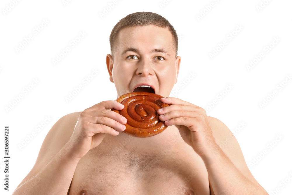 Overweight man with tasty sausage on white background