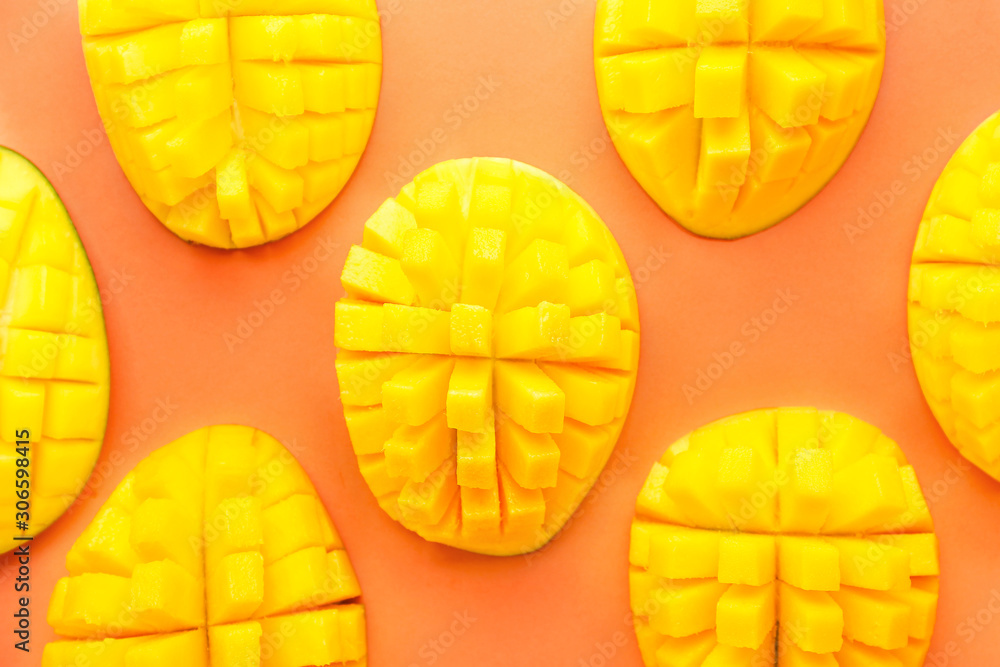 Sweet cut mangoes on color background