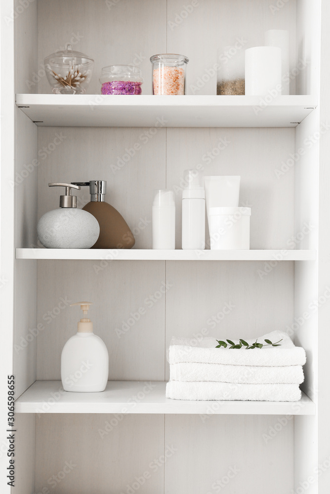 Shelf unit with towels and cosmetics