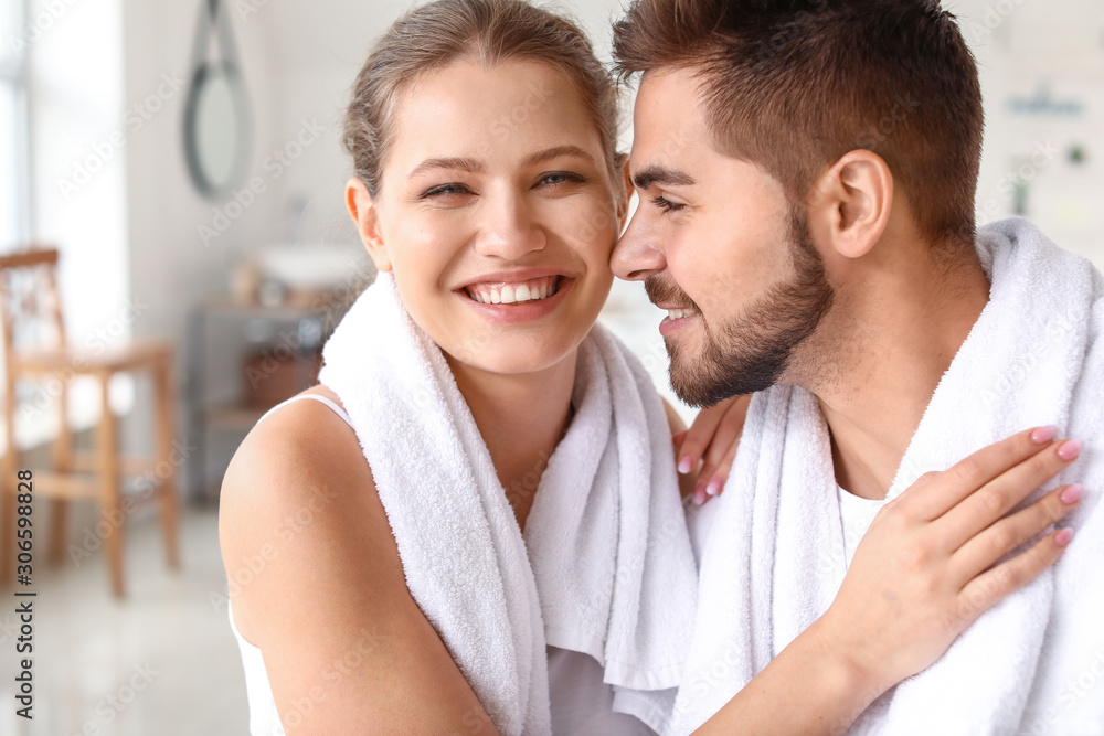 Morning of happy young couple in bathroom