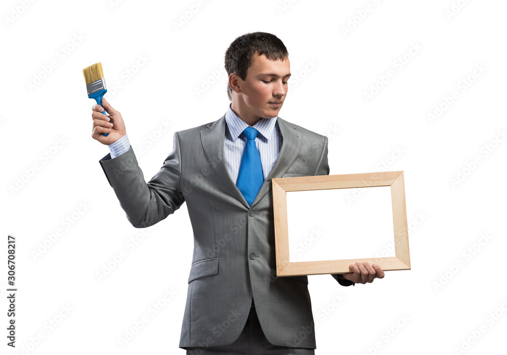 Creative businessman painter holding paintbrush