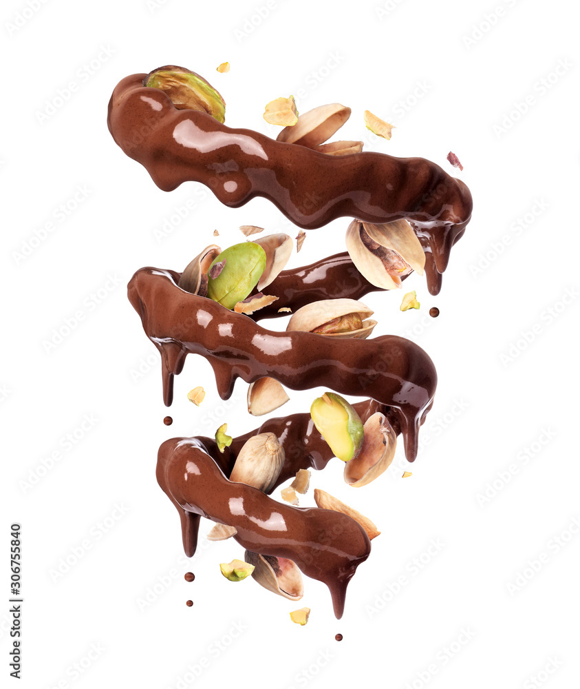 Chocolate splashes in spiral shape with crushed pistachios, isolated on a white background