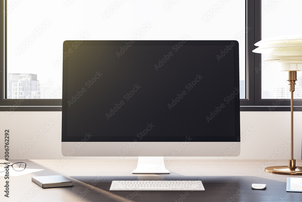 Desktop with empty black computer screen