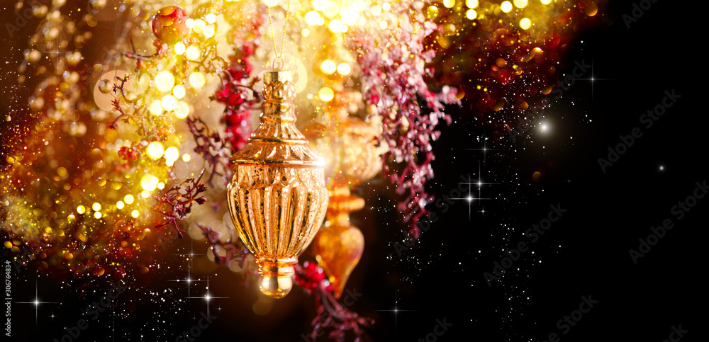 Christmas and New Year Golden Decoration. Abstract Blurred Bokeh Holiday Background with beautiful b