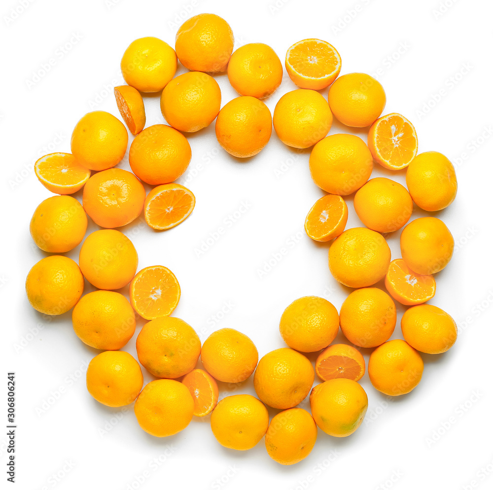 Frame made of ripe tasty tangerines on white background